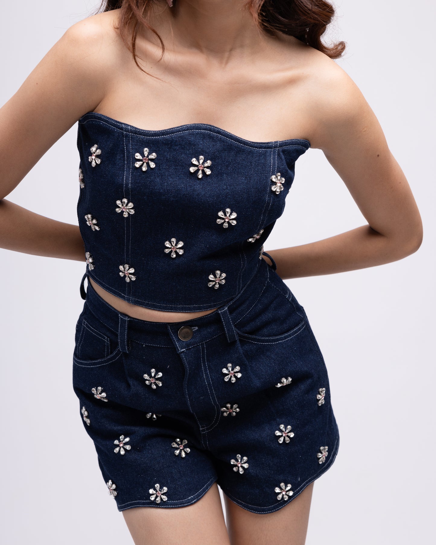 High-waisted scalloped denim shorts with embellishments