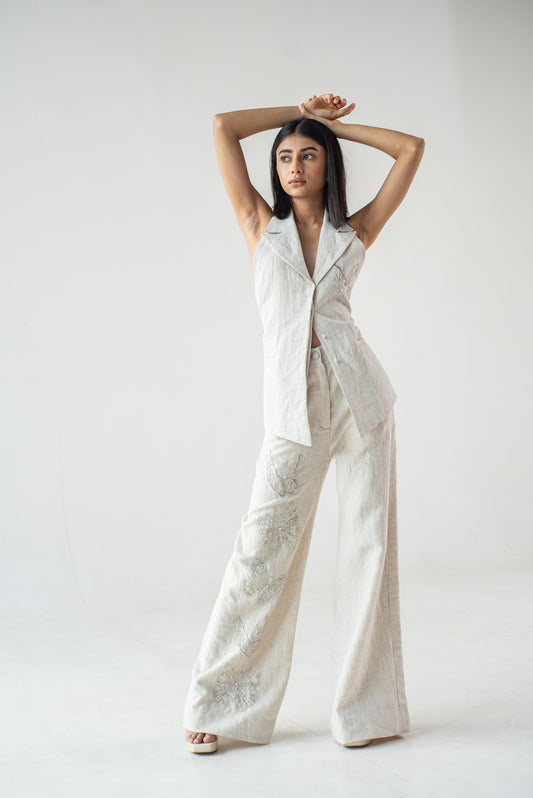 Hand-embroidered 100% linen trousers with butterfly motifs