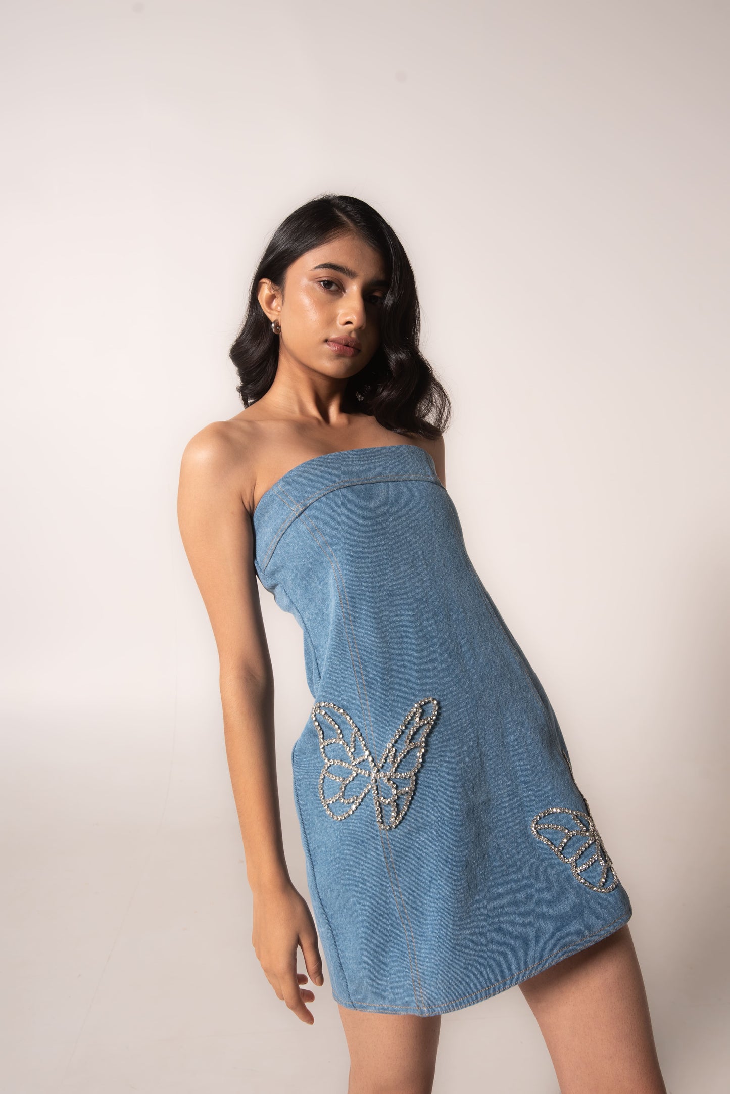 Off-shoulder denim mini with butterflies