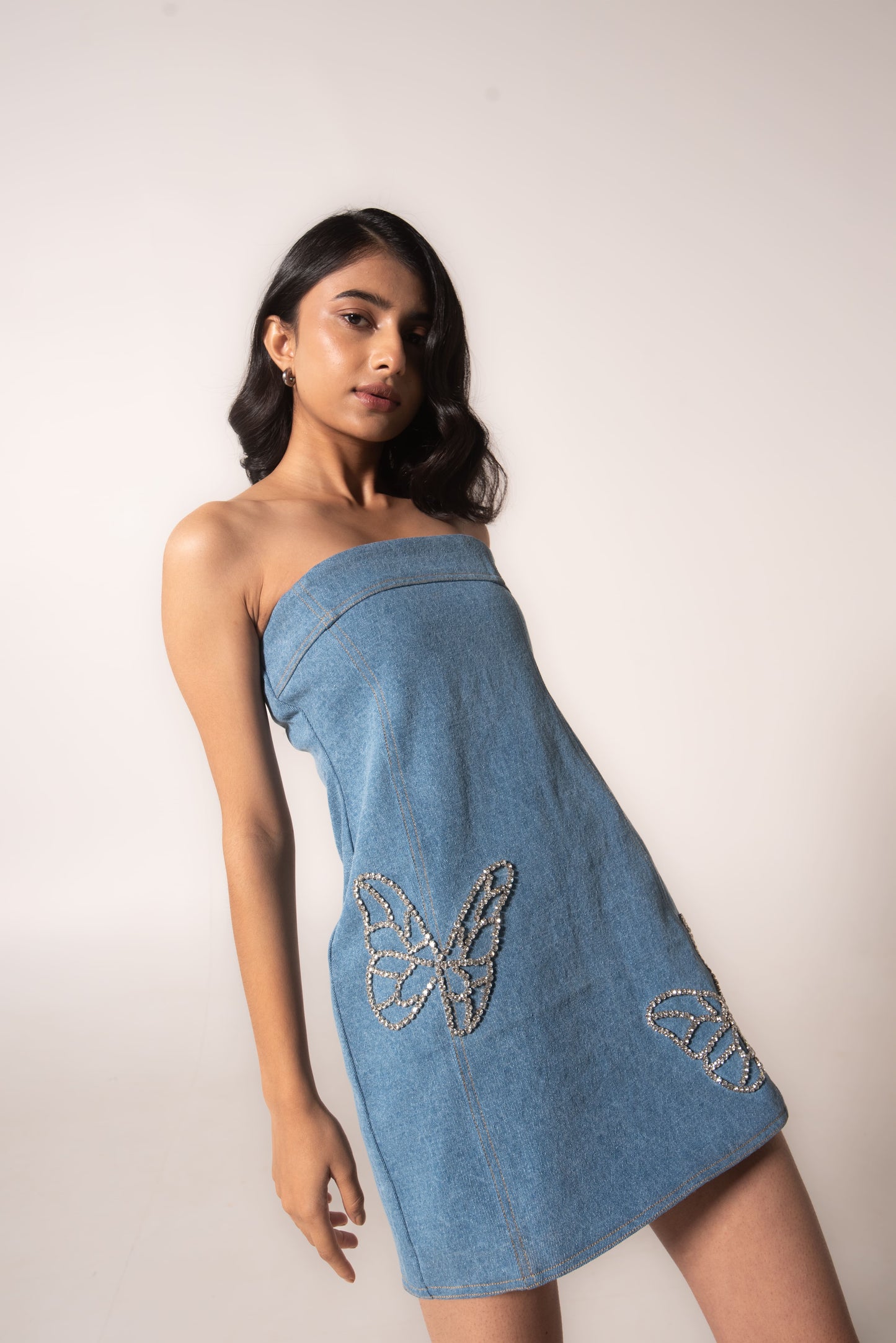 Off-shoulder denim mini with butterflies