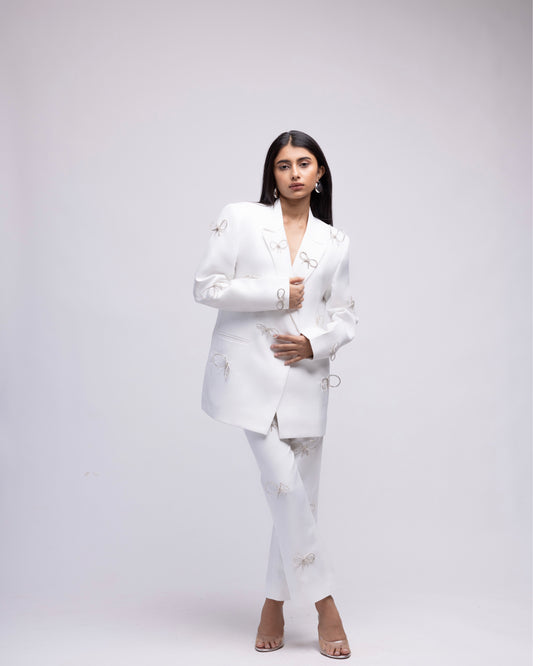 High-waisted ankle length trousers with rhinestone bows LIMITED EDITION