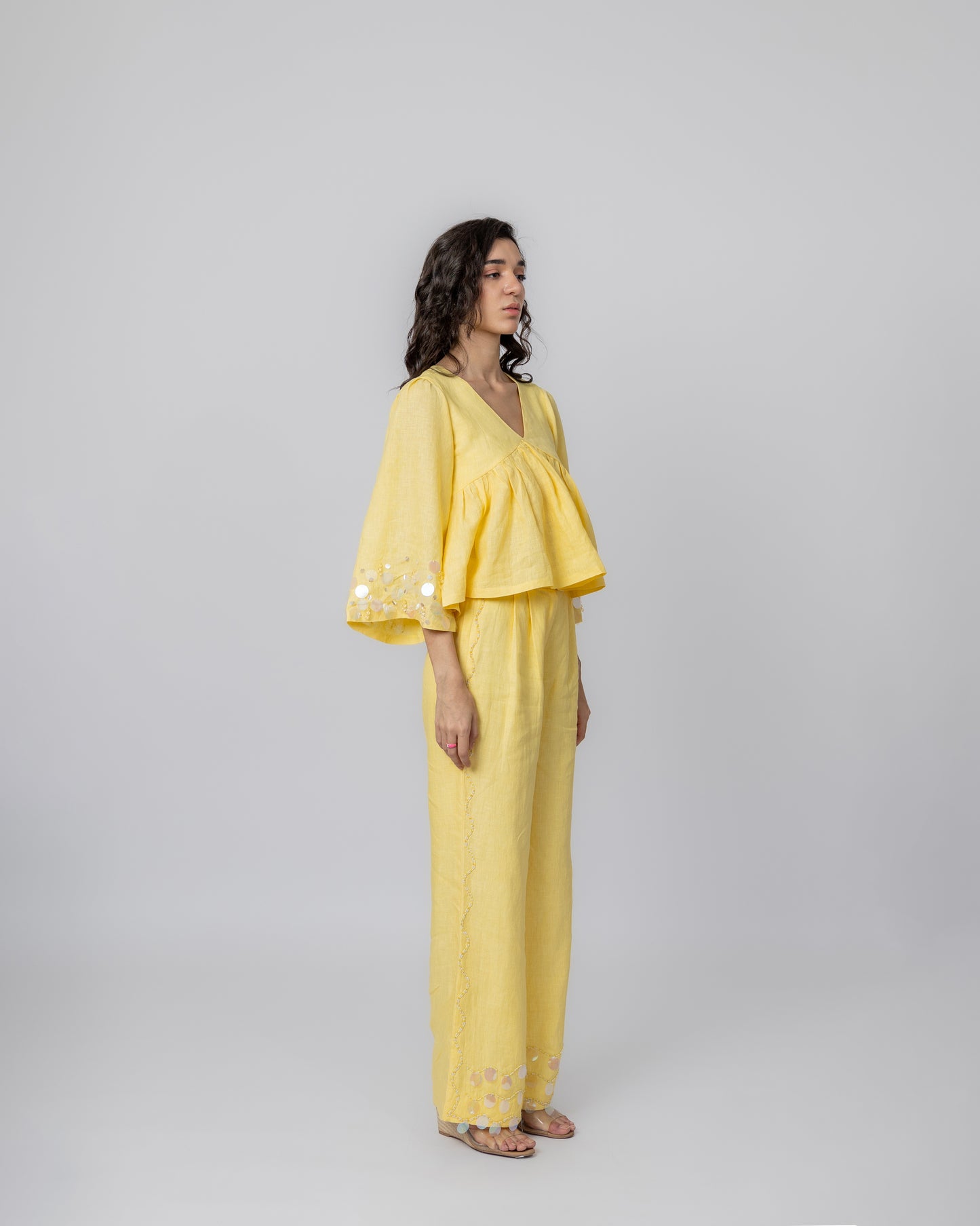 100% Linen long-sleeved beaded peplum with sequin detailing