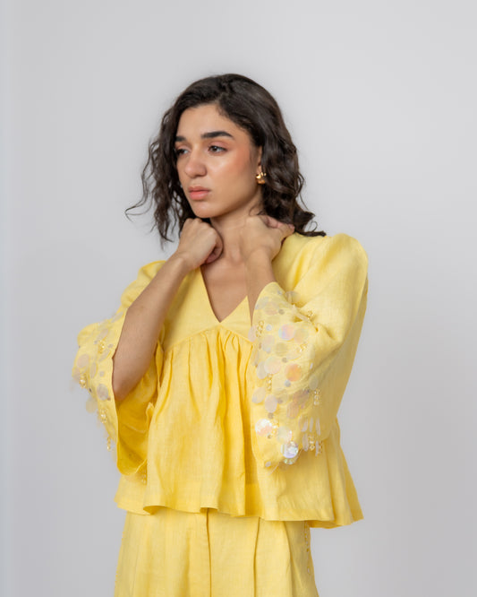 100% Linen long-sleeved beaded peplum with sequin detailing