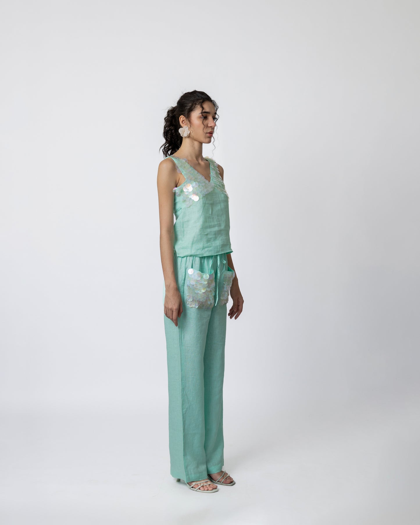 100% linen trousers with sequin pocket