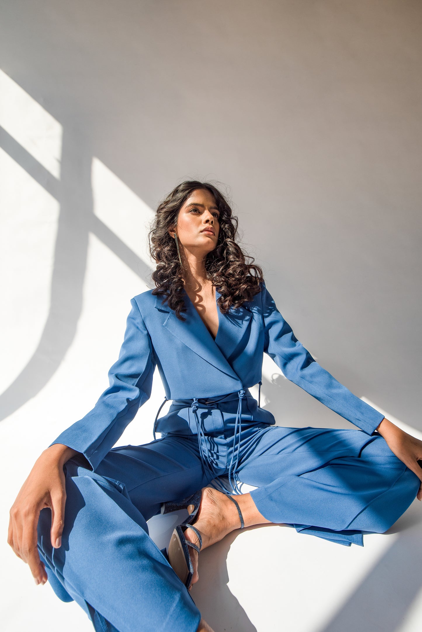 High-waist trousers with side slits