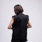 Sleeveless denim jacket with multi-colour embellished hearts