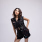 Sleeveless denim jacket with multi-colour embellished hearts