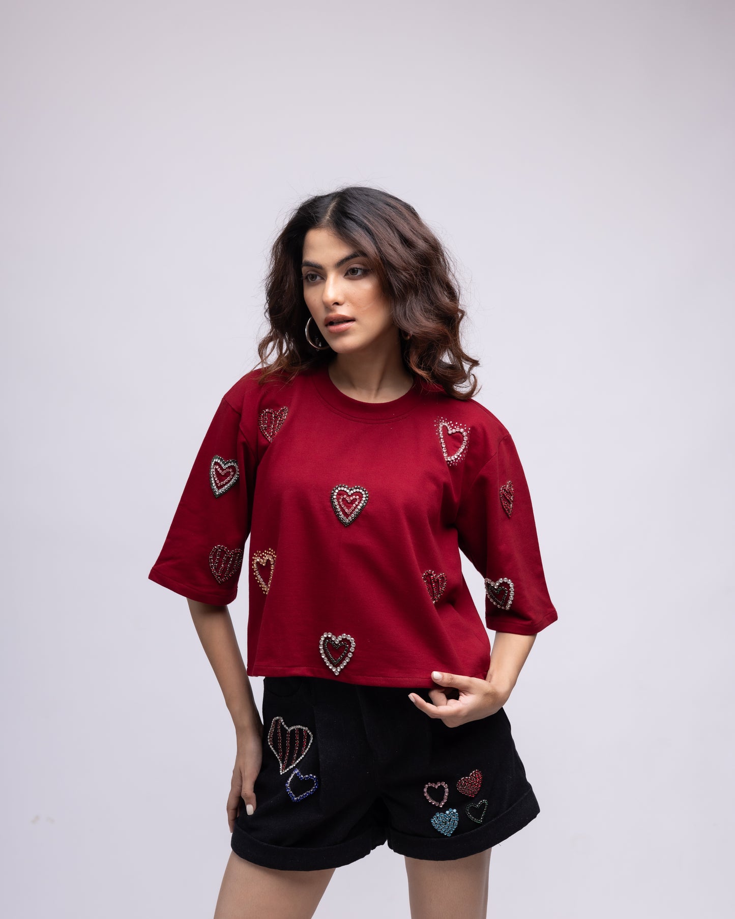 Pleated denim shorts with multi-colour embellished hearts