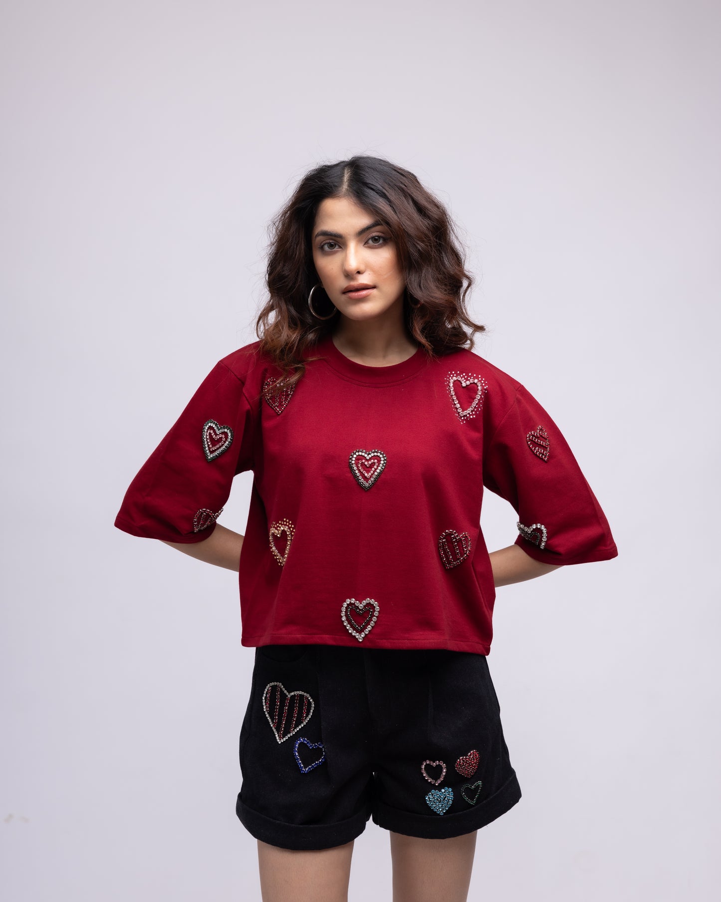 Pleated denim shorts with multi-colour embellished hearts