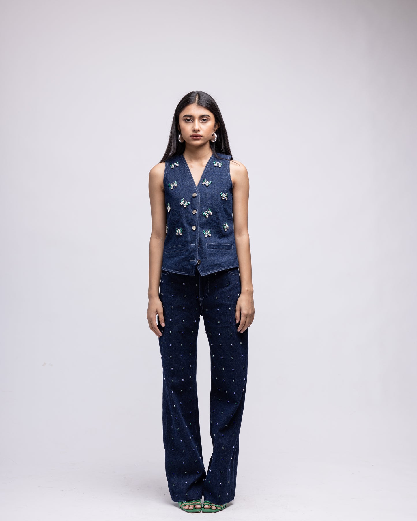 Sleeveless denim waistcoat with embellished butterflies