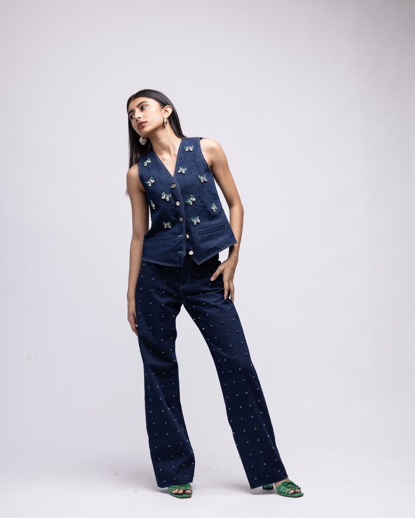 Sleeveless denim waistcoat with embellished butterflies