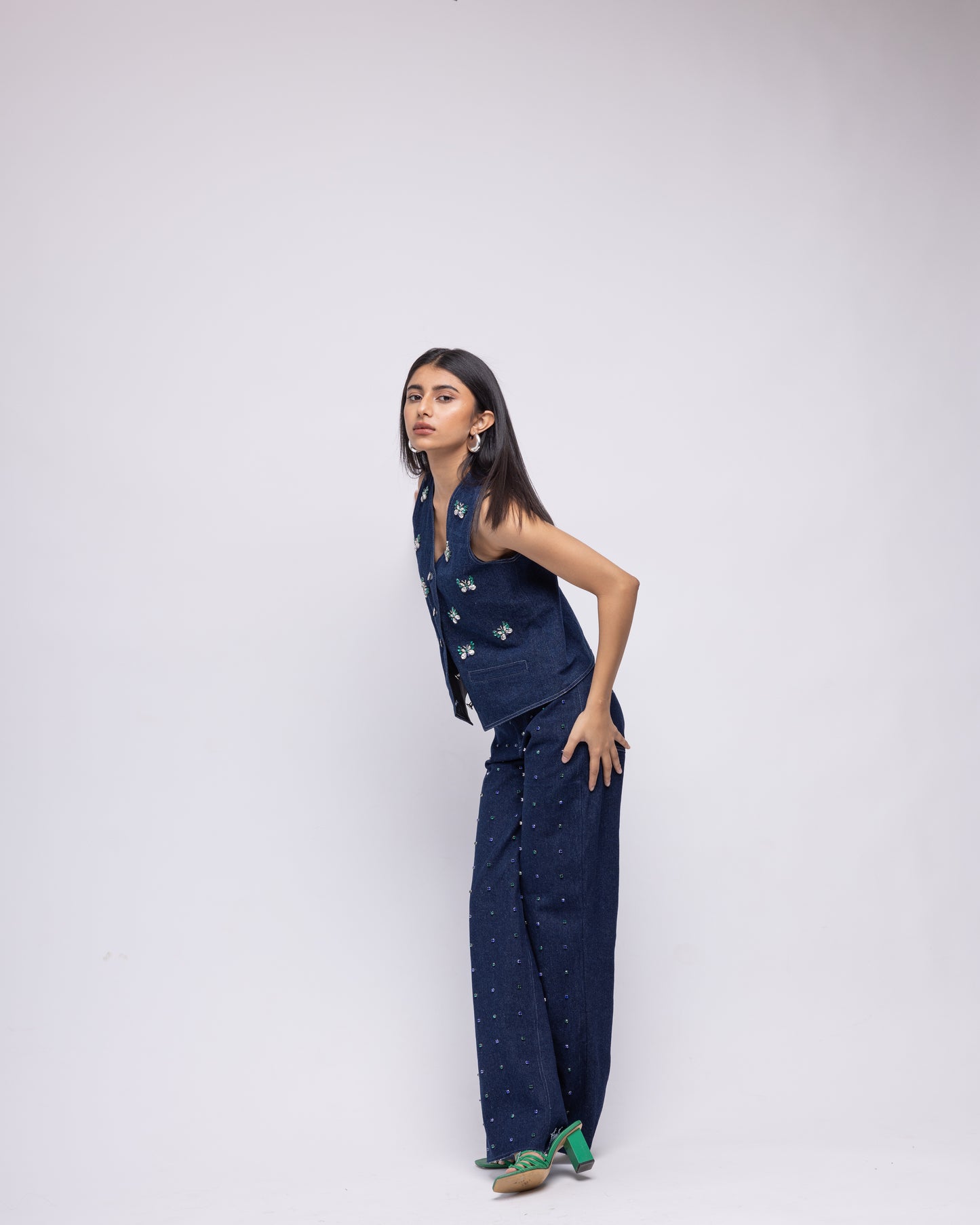 Sleeveless denim waistcoat with embellished butterflies