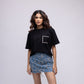 Denim mini skirt with embellished bows