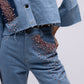 High-waisted ankle-length jeans with multi-colour embellishments