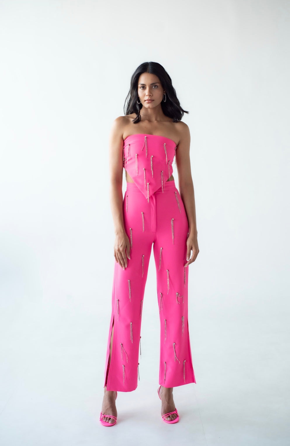 High-waisted embellished trousers with chain detail