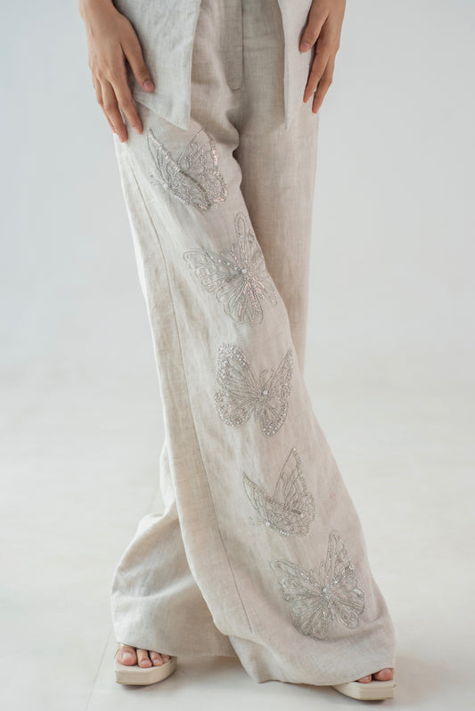 Hand-embroidered 100% linen trousers with butterfly motifs