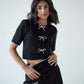 Glitter mini skirt with shiny bows