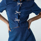 Cropped glitter shirt with shiny bows
