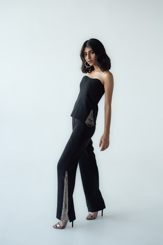High-waisted straight trousers with slit and chain detail