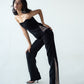 High-waisted straight trousers with slit and chain detail