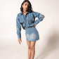 Denim mini skirt with floral embellishments