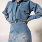 Denim mini skirt with floral embellishments