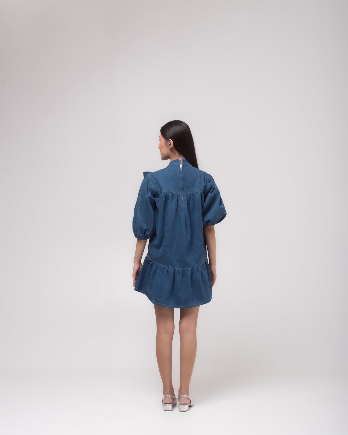 Short denim dress with embellished bow