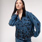 Embroidered denim jacket with velvet collar