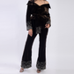 High-waist velvet trousers with embellishments