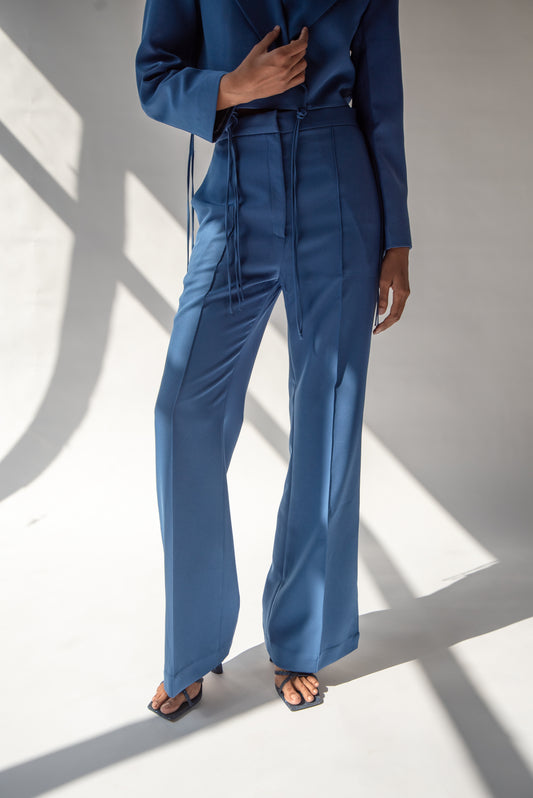 High-waist trousers with side slits