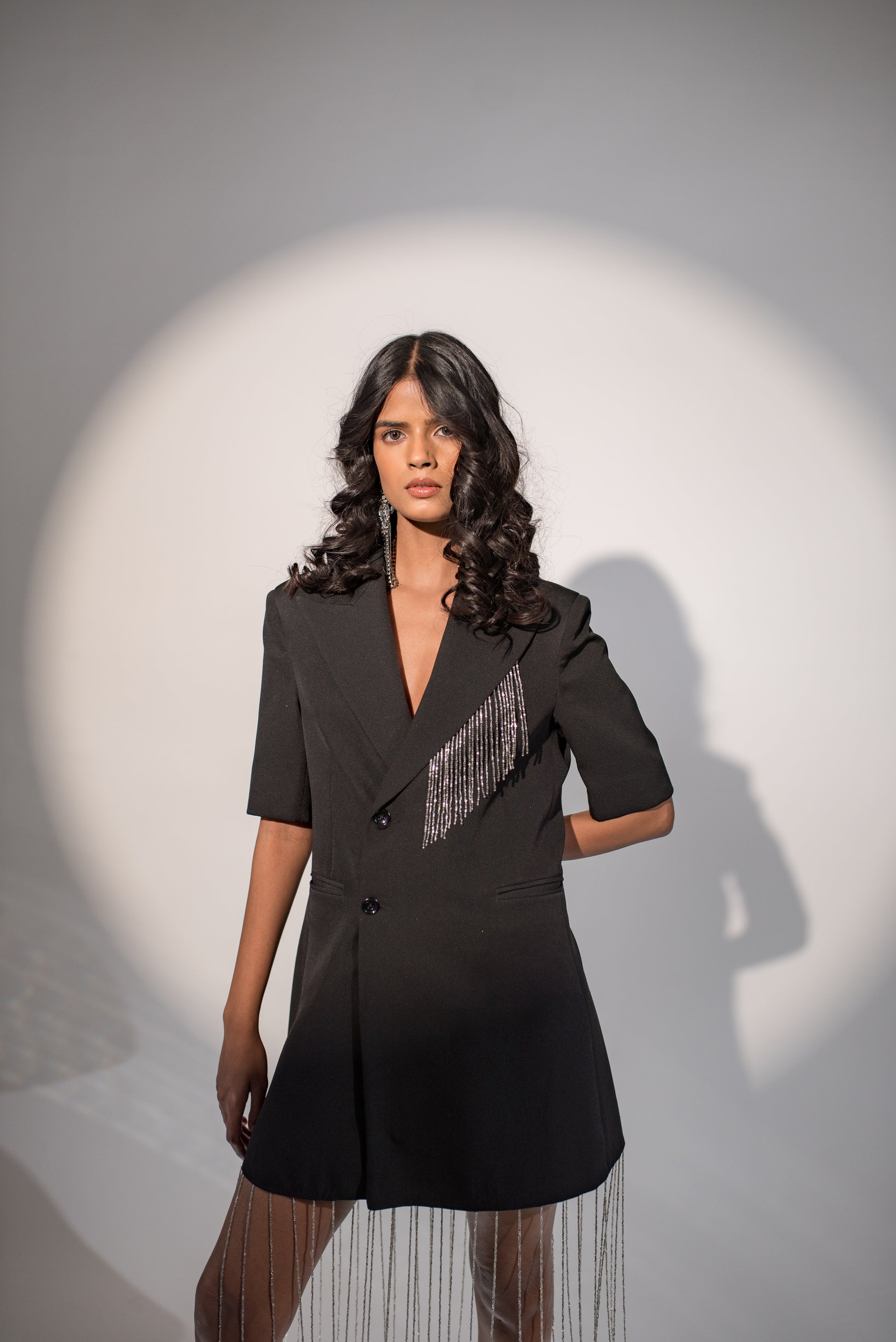 Half-sleeved blazer dress with long chain detailing Half-sleeved blazer dress with long chain detailing