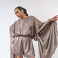 Long-sleeved satin playsuit