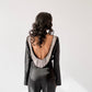 Flared sleeve top with rhinestone chain detailed back