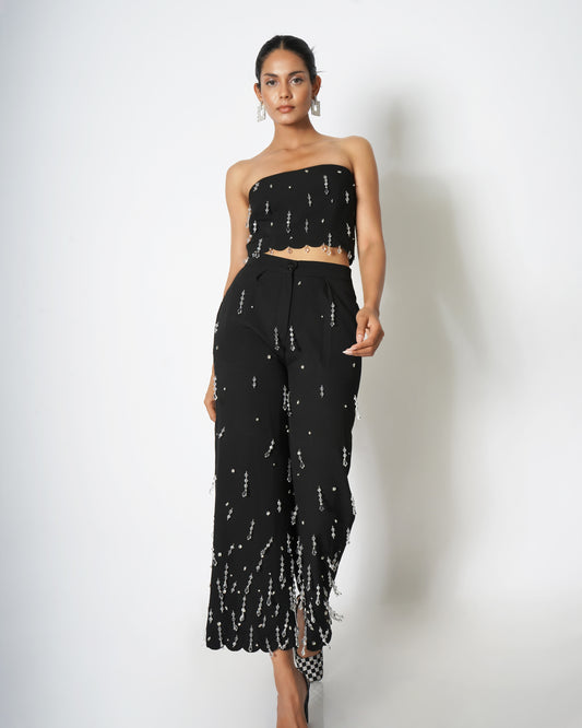 High-waisted trousers with drop embellishments