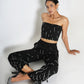 High-waisted trousers with drop embellishments