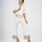 High-waisted trousers with rhinestone chain detail