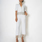 High-waisted trousers with rhinestone chain detail
