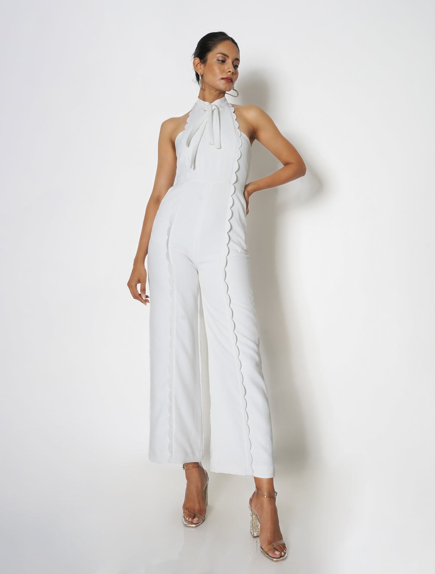 Halter-neck jumpsuit with scalloped detail